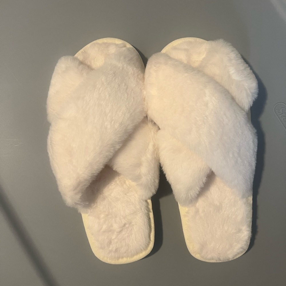 White fuzzy slippers (never worn)